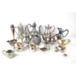 A quantity of pewter and silver plate to include tea and coffee pots, sauce boat and other items.