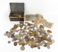 A group of GB and worldwide coinage, some silver, together with a quantity of banknotes.