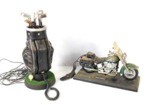 A novelty telephone in the form of a bag of golf clubs and a Harley Davidson telephone.