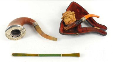 A silver mounted calabash smoking pipe together with a Meerschaum pipe, the bowl in the form of a