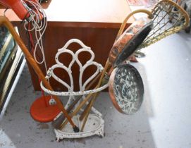 A Victorian cast iron umbrella stand, together with copper hunting horn, two walking canes, lacrosse