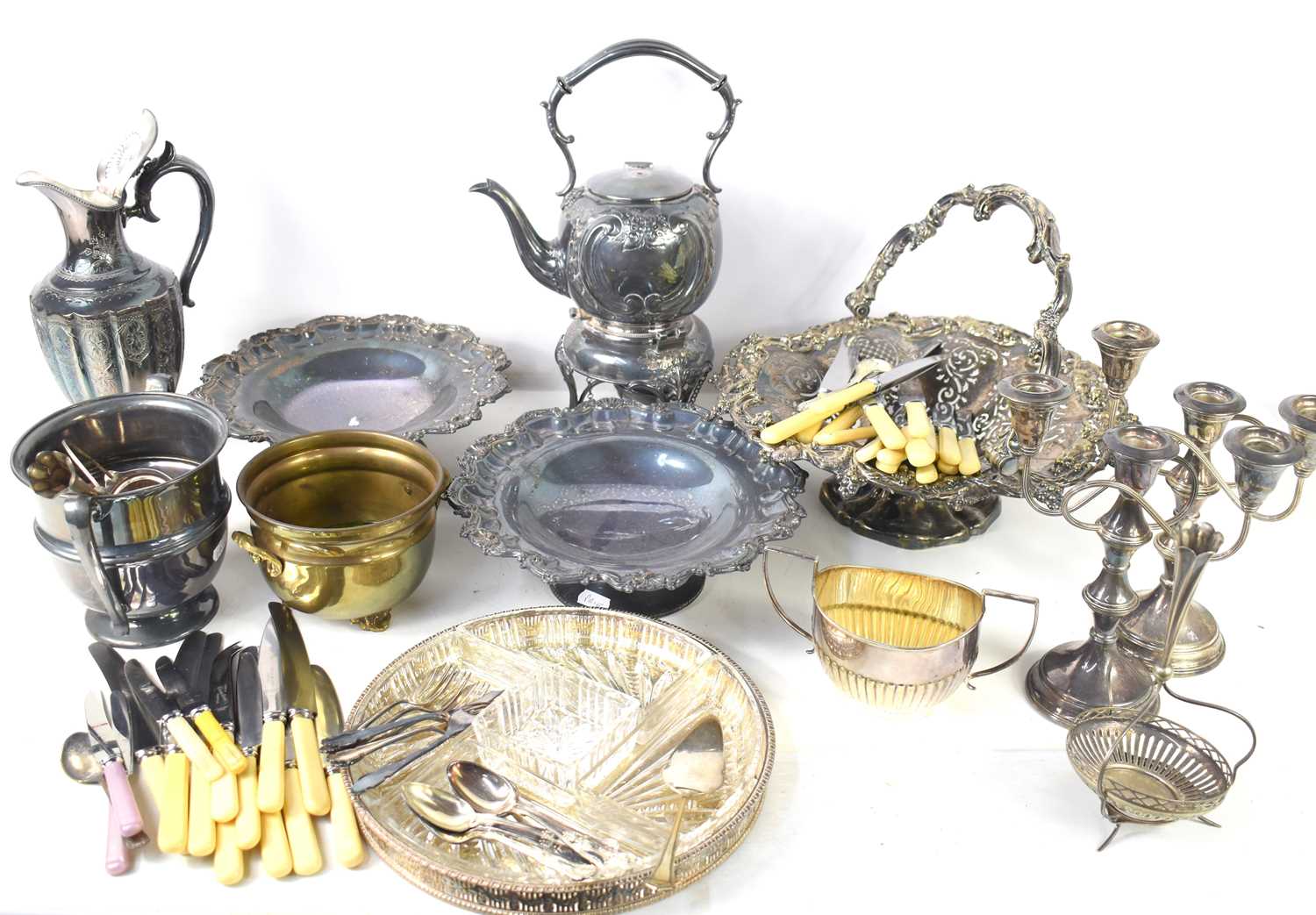 A group of silver plated items to include teapot, dish and other items.