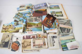 A collection of vintage postcards, some early 20th century, mostly mid and later 20th century,