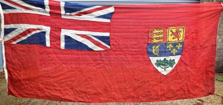 A large vintage Canadian red ensign flag, this design was used from 1922 to 1957, 127cm by 278cm.