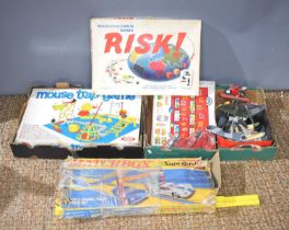 A vintage Matchbox Superfast track race set together with a Mouse trap game, model planes and