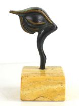 A bronze 'Eye of Horus' sculpture, apparently unsigned, raised on marble base,10cm high.