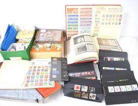 A collection of stamps, many mint, to include commemorative examples and various catalogues.