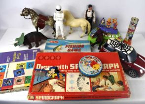 A group of vintage toys and board games to include Merit Magnetic Fishing Game, Spirograph, action