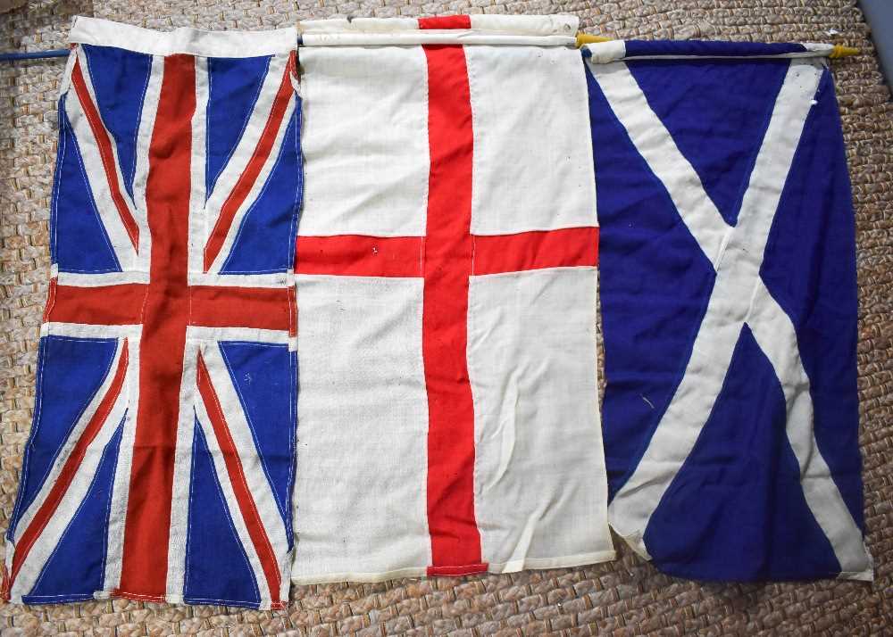 Three vintage flags representing Great Britain, England, Scotland. 92 by 44cm.