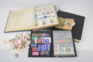 A collection of stamps, including various late 19th and early 20th century loose examples, an