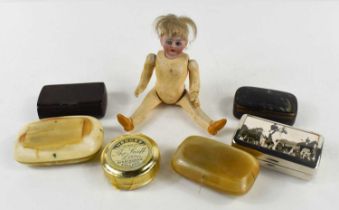 A group of snuff boxes, including two horn examples and a sealed tin of snuff, together with a small