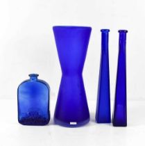 An Ulrica Hydman Vallien for Kosta Boda blue glass vase, 33cm high, unsigned, together with three