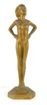An Art Deco style metal sculpture of a nude lady, 30cm high.