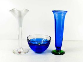 Three pieces of Orrefors of Sweden glass, to include a white glass bud vase with wavy rim, a blue