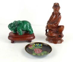 A Chinese cloisonne pin dish depicting floral group together with a carved jade elephant on stand,