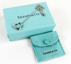 An Elsa Peretti for Tiffany & Co platinum heart pendant and chain, 5.5g, with the original leather