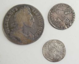 Three William III silver coins comprising of a full crown dated 1696 and a shilling and sixpence.