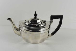 A 19th century silver teapot, with ebonised handle and finial, Chester 1924, 20toz.
