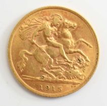 A George V gold half sovereign, dated 1915.