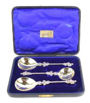 A set of late Victorian dessert serving spoons in the Elizabethan Renaissance style, having silver