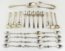 A group of silver teaspoons together with a silver desert spoon, a set of Italian white metal spoons