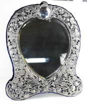 A fine Victorian heart shaped dressing table mirror with a bevelled shaped glass, decorated with