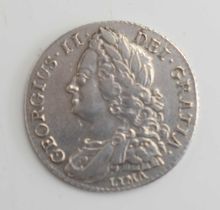 A George III silver "Lima" shilling, dated 1745, v/f.