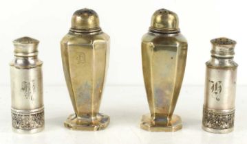 Four silver pepper pots by Gorham Company, one pair of octagonal form the other pair of circular