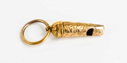 A small gold whistle, unmarked but testing as at least 9ct gold, engraved with chased decoration, on