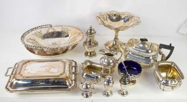 A group of silver plate including a pedestal bowl, fruit basket with swing handle, sugar drefter and