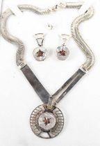 A silver, mother of pearl, abalone shell and coral inlaid demi parure of earrings, pendant and