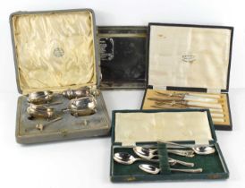 A group of silver to include a part cruet set, silver teaspoons, silver knives and forks with mother