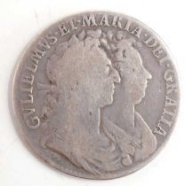 A William & Mary silver half-crown dated 1689.