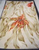 A pure wool Tropics Collection rug, the cream ground decorated with a large and flamboyant parrot