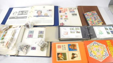 A collection of stamps comprising first day covers, including one for the 1966 World Cup, and