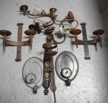 A selection of wall lights, of various form to include a pair of pewter style oval backed