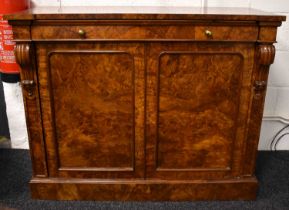 A Victorian burr walnut chiffonier sideboard having two drawers above two cupboard doors, with