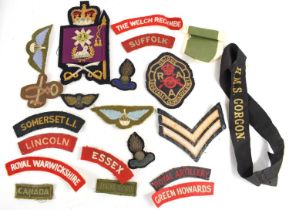 A group of regimental patches to include Lorne Scots, Somerset, Royal Artillery, Green Howards,