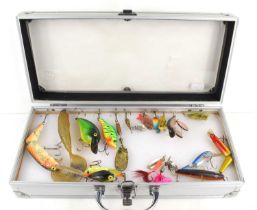 A group of fishing lures, some vintage, to include examples by Mepps, Abu and others.