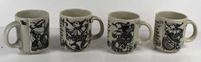 A group of four Rosenthal Studio Linie pottery mugs, each with black and white decoration with