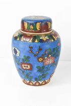 A cloisonne on stoneware ginger jar and cover, the cobalt blue ground decorated with birds amongst