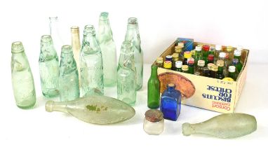 A group of codd and torpedo glass bottles to include E.W Beckett of Bourne, J. Miller & Childs, C.