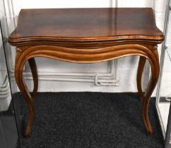 A 19th century mahogany card table, with green lined top, and raised on cabriole legs, 73cm high.