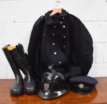 Fire Service uniform to include a vintage black jacket, a vintage black helmet with crest for Hull