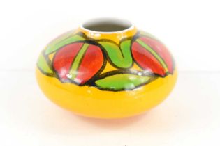 A Poole pottery Delphis onion vase, yellow background with orange, red and green painted abstract