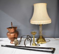 A glass and gilt metal table lamp, in the form of a Corinthian column, two antique walking canes;