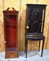 An Edwardian mahogany and glass fronted three gun display cabinet together with a late Victorian