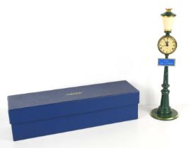 A Jaeger LeCoultre novelty clock in the form of a Parisian street lamp, the signed cream dial with