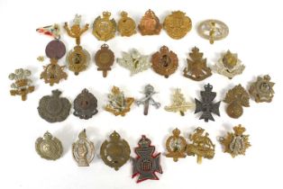 A group of cap badges for British regiments including a The Royal Australian Engineers, Royal