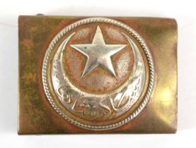 A WWI Ottoman Turkish brass belt buckle, 6.2 by 4.6cm